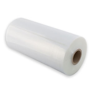 A roll of clear plastic film wrap on a cardboard core.