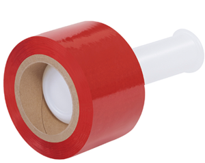 A roll of red adhesive tape on a white dispenser.