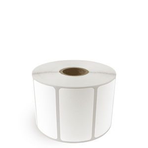 Roll of white adhesive labels on a continuous paper backing.