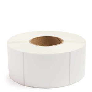 A roll of white adhesive labels with a brown core.