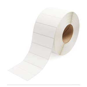A roll of blank white adhesive labels for printing.