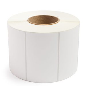 A roll of blank white adhesive labels with a brown core.