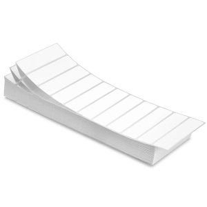 A stack of blank white labels with a grid design.