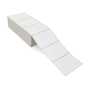 A roll of blank white labels arranged in a partially unrolled strip.