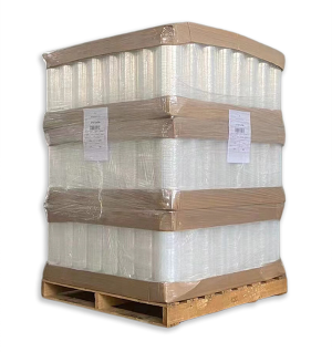 Large stack of clear plastic bottles on a wooden pallet wrapped in plastic.
